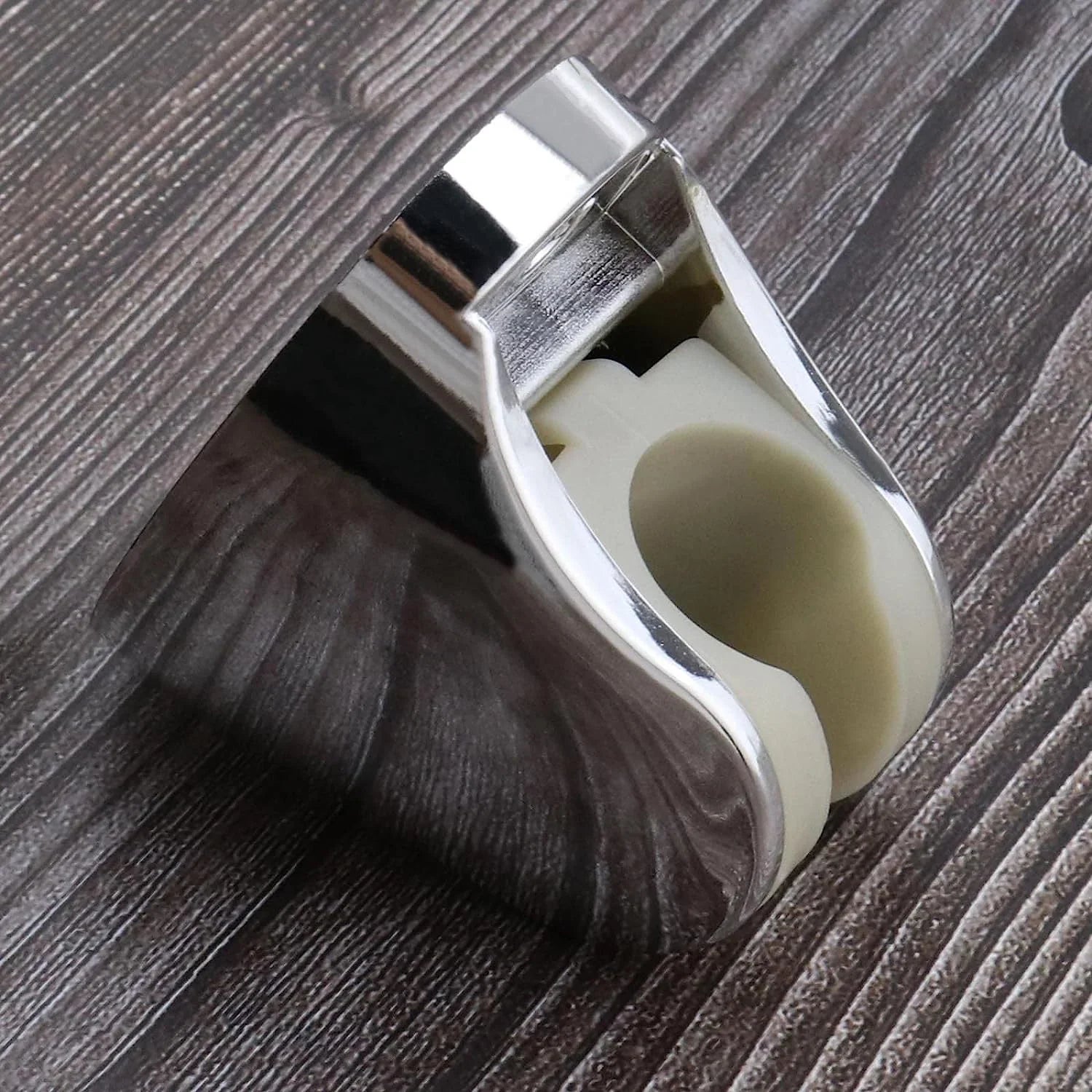 Adjustable hand shower holder with screws. Adjustable hand shower holder with screws.